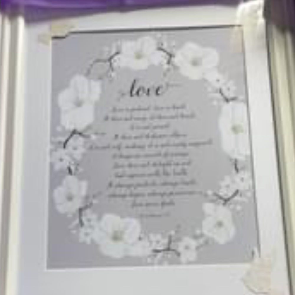 White picture frame with a poem inside